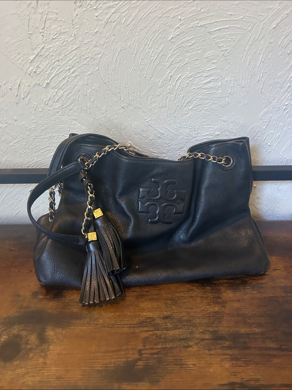 Tory Burch Black Leather Shoulder Bag with Tassel and Chain Strap